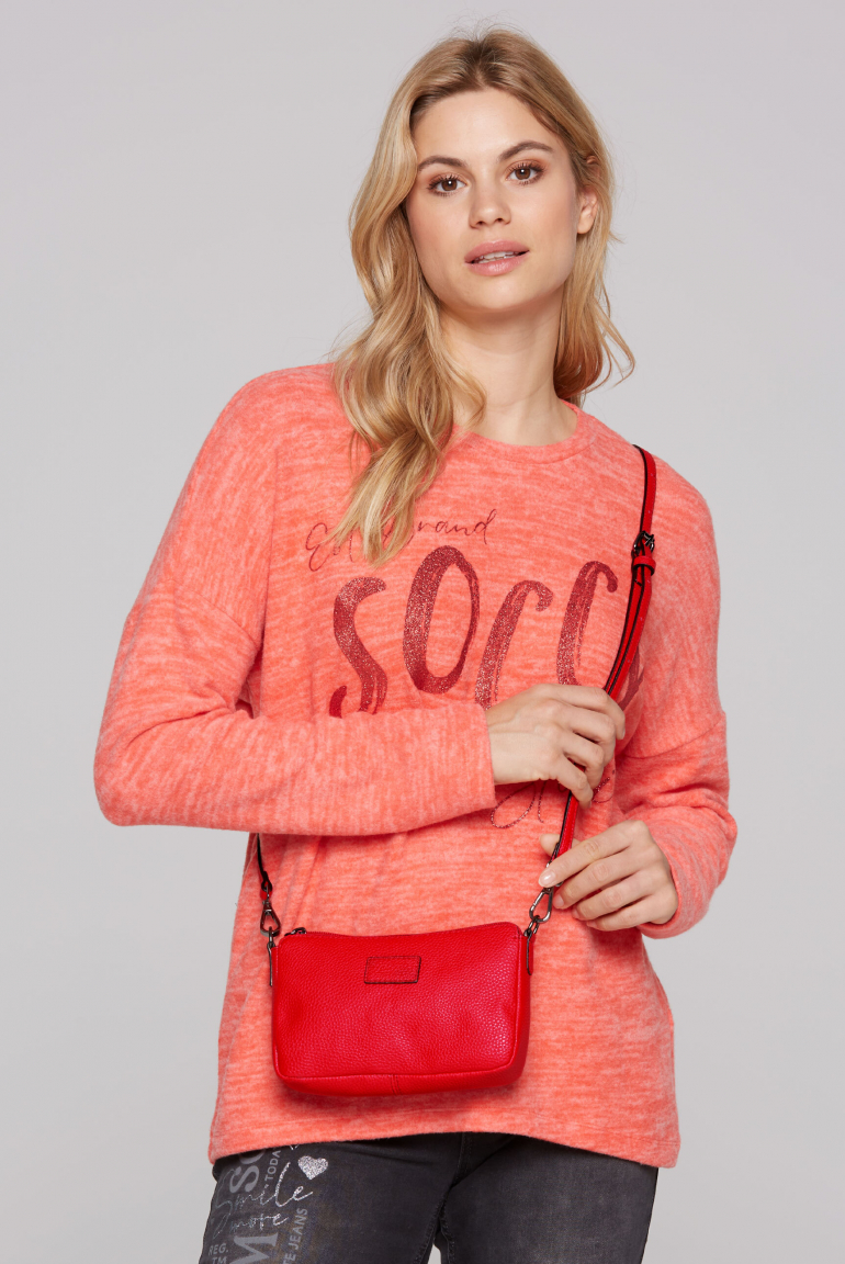 Malá crossbody taška se štítkem 