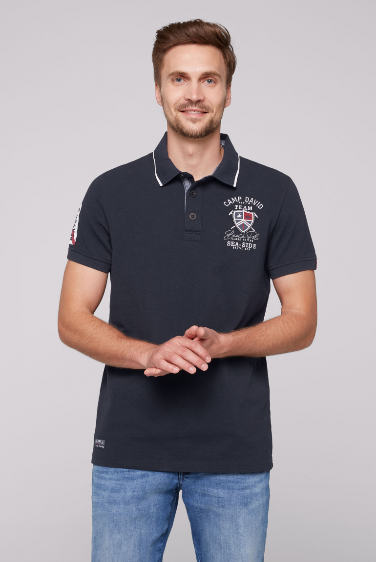Polo tričko z piké se značkovými nášivkami a výšivkami 