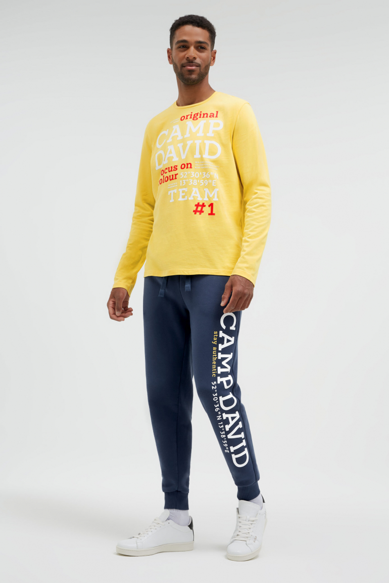 Tepláky s gumovým potiskem loga