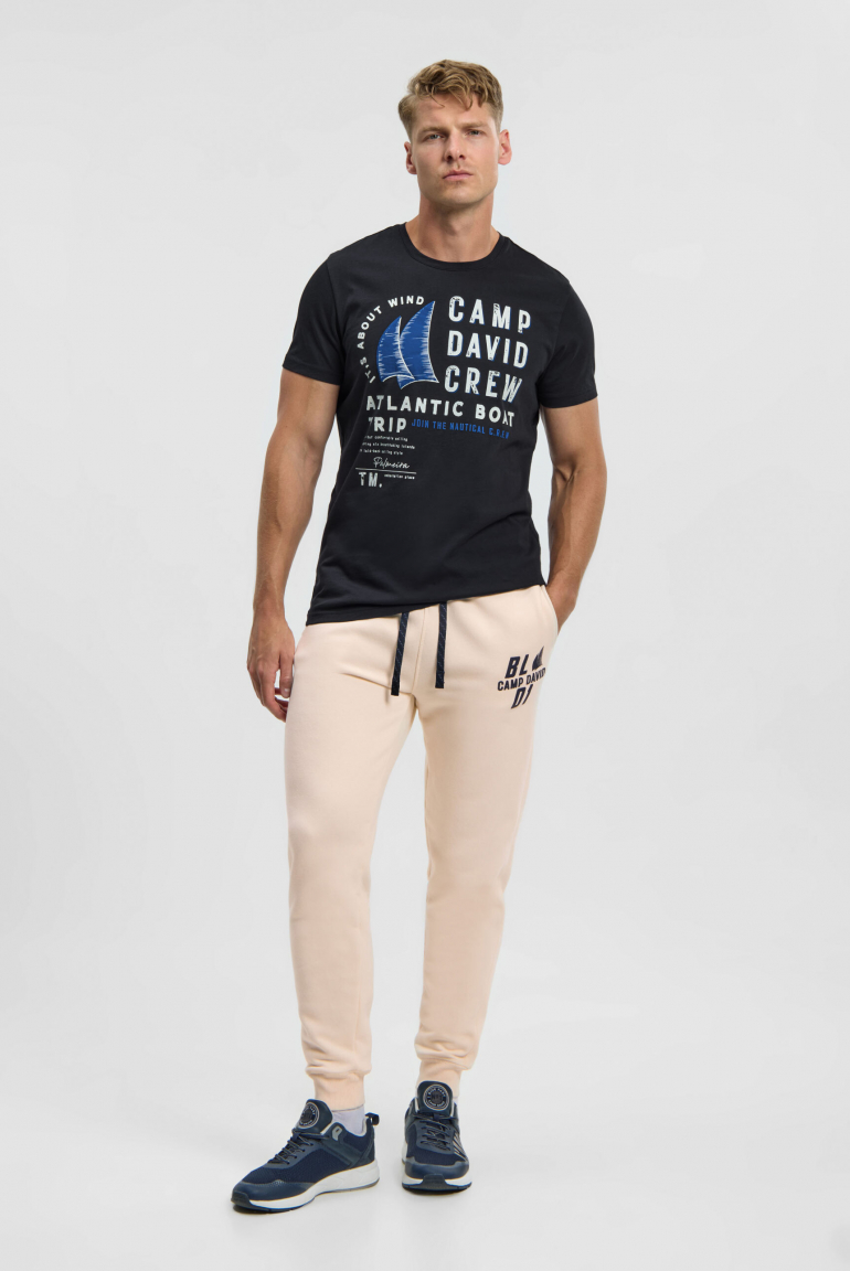 Tepláky s reliéfním potiskem