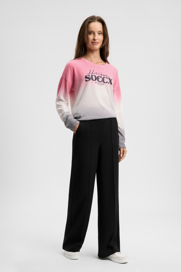 Široké kalhoty s elastickým pasem a prošíváním