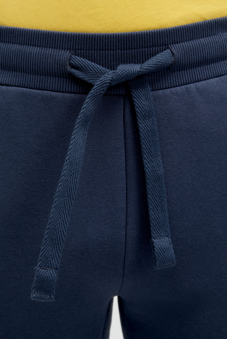 Tepláky s gumovým potiskem loga