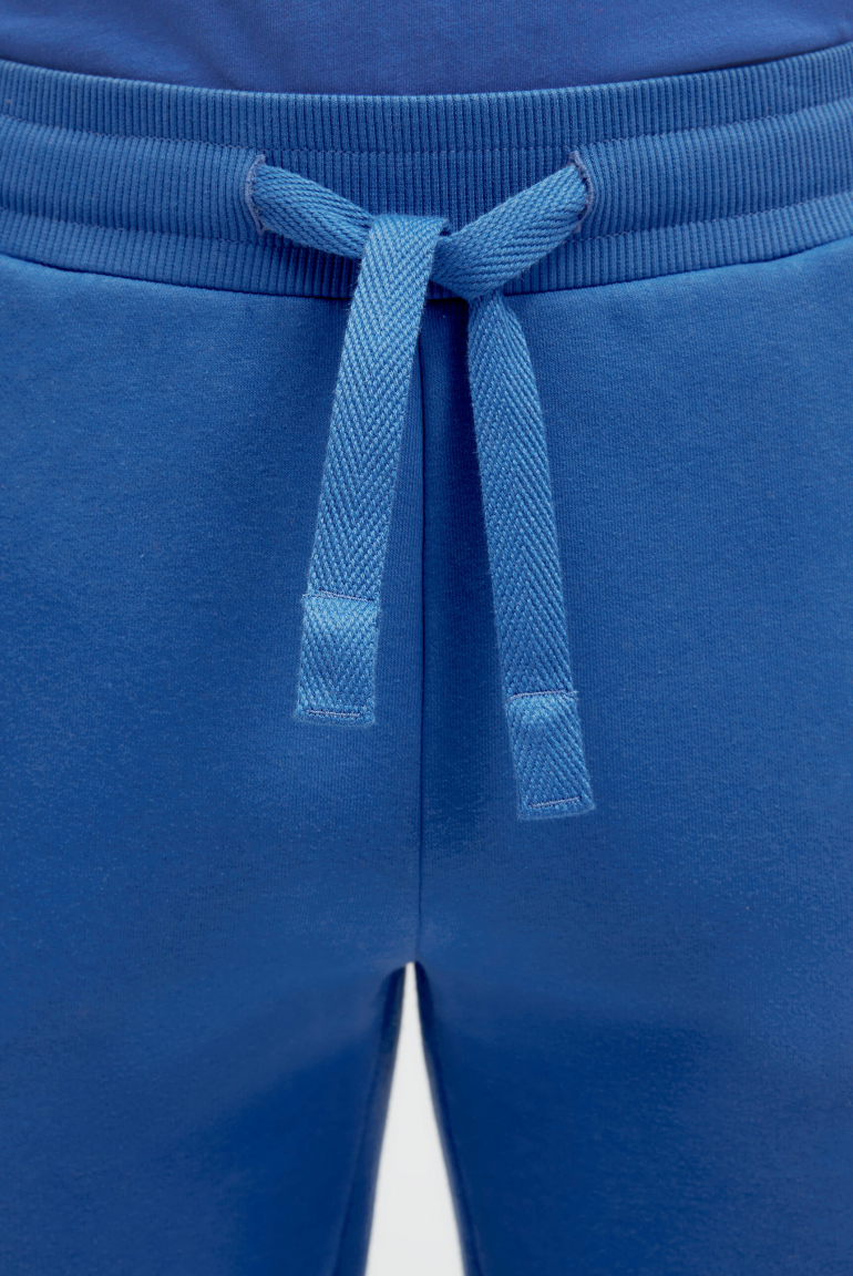 Tepláky s gumovým potiskem loga