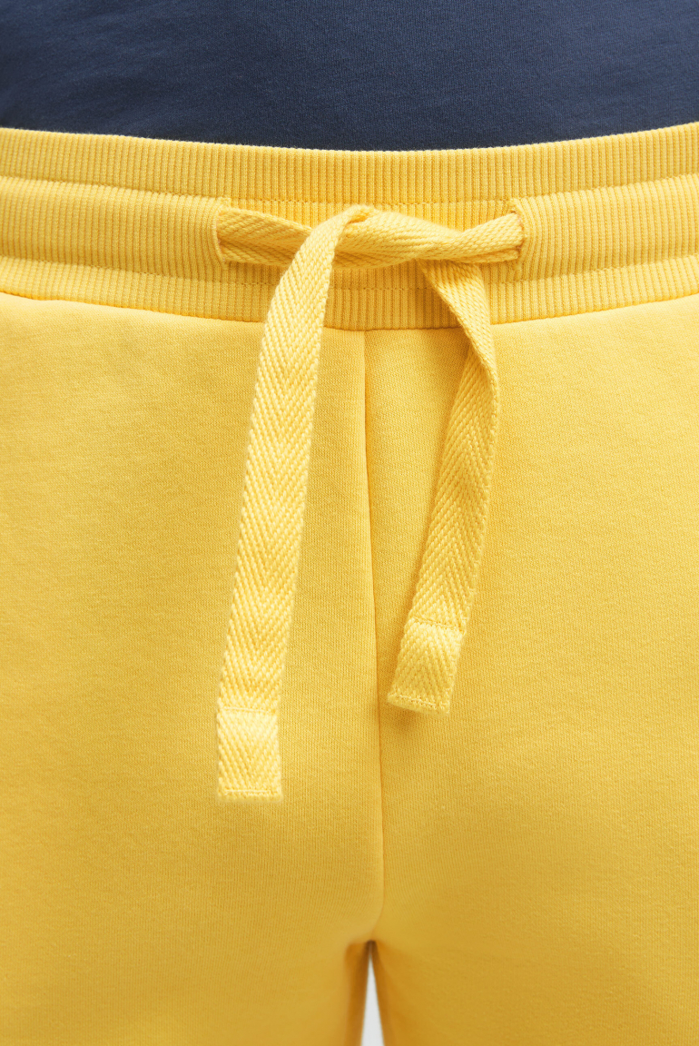 Tepláky s gumovým potiskem loga