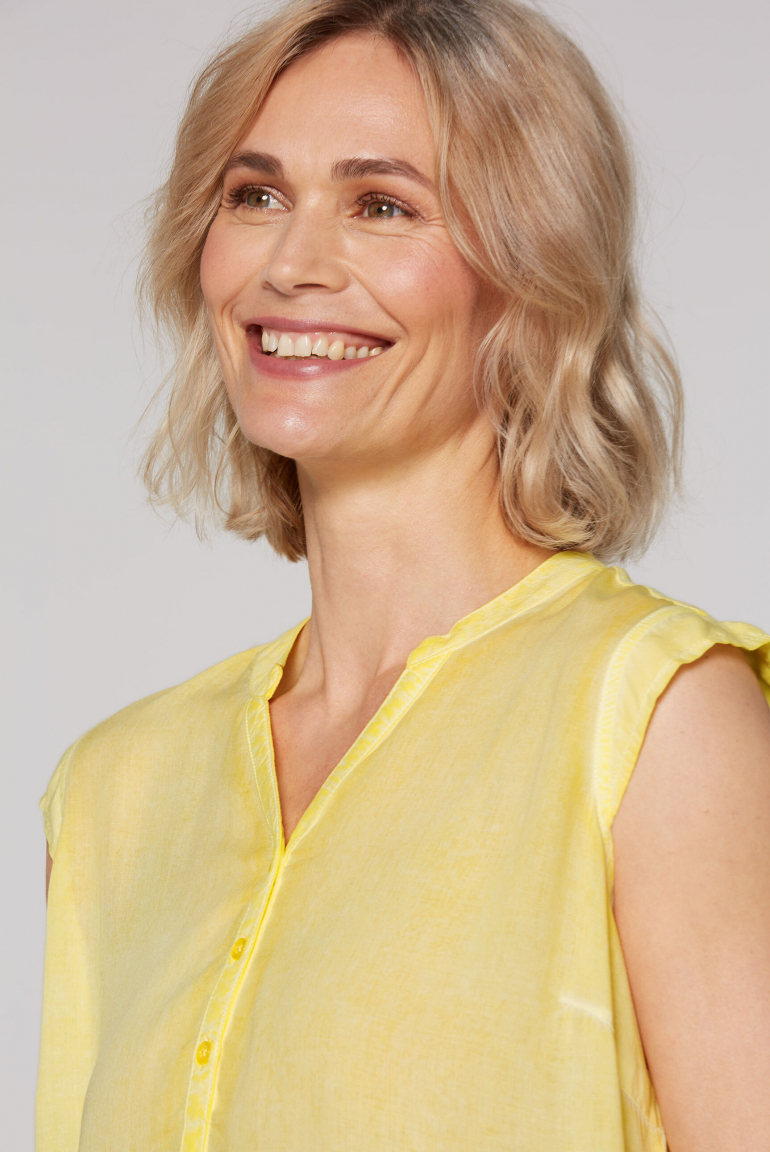 Halenka bez rukávů s nařaseným elastickým lemem a potiskem na zádech