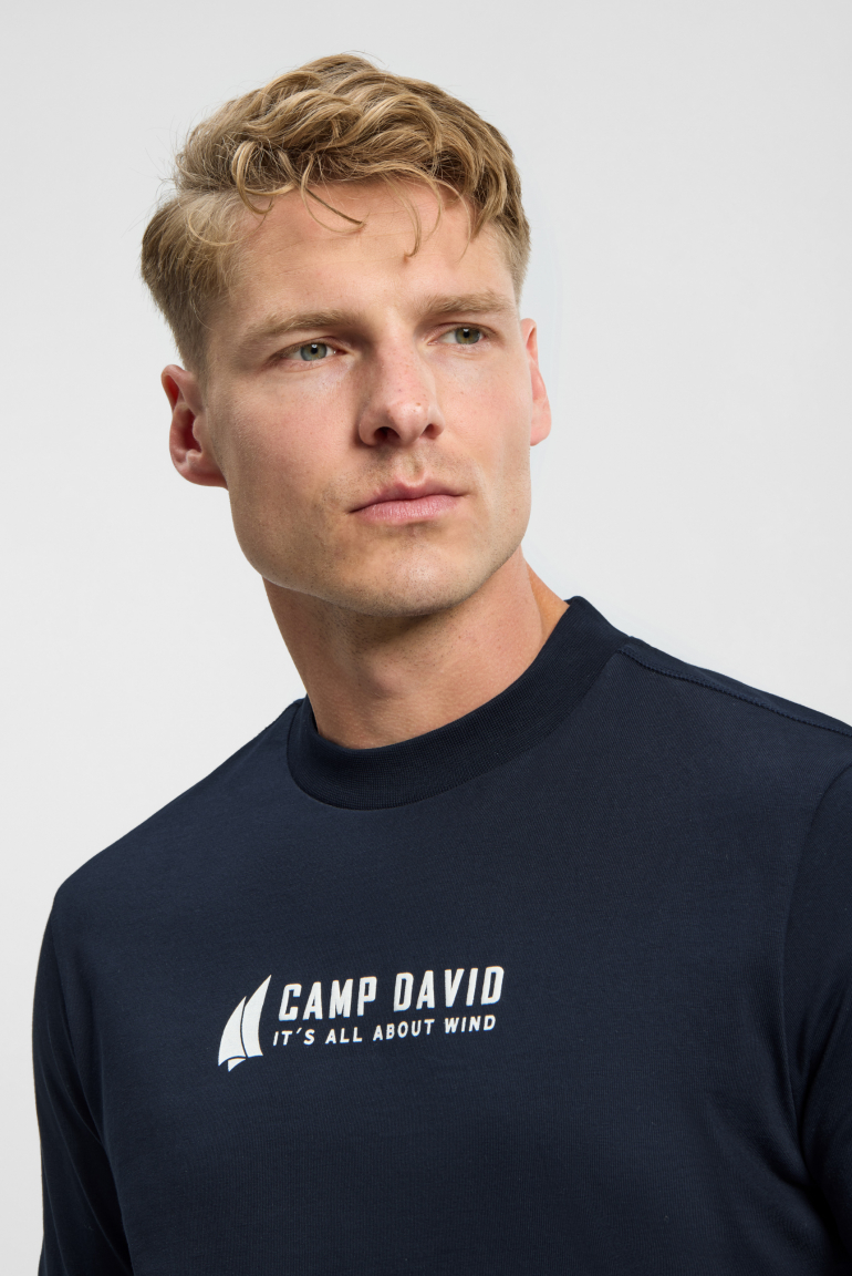 Tričko s dlouhým rukávem a artworkem na zádech