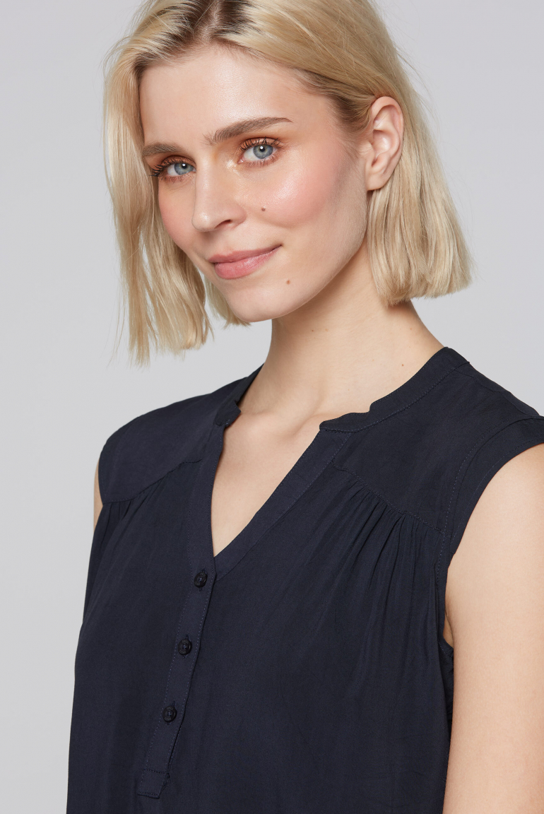 Halenka bez rukávů s artworkem na zádech