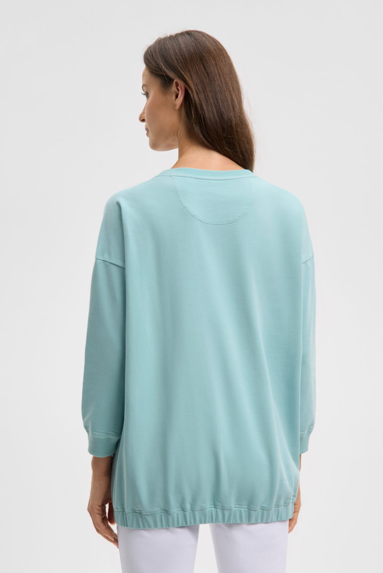 Mikina s elastickým lemem a flitrovým logem