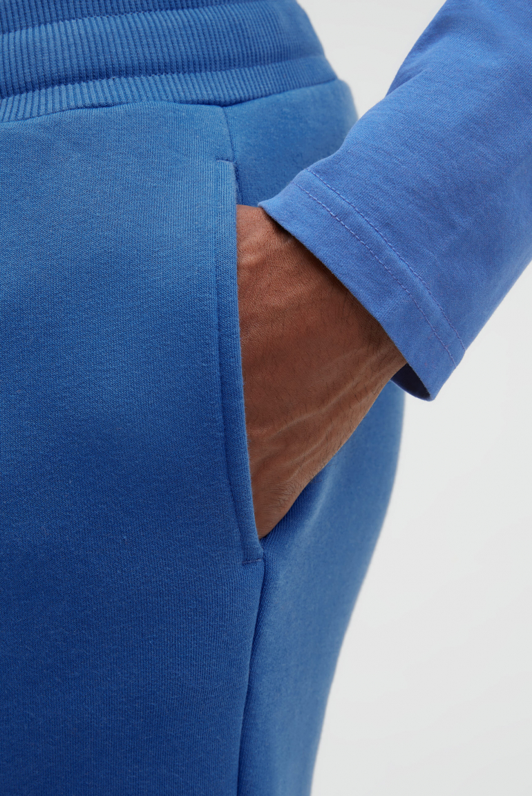 Tepláky s gumovým potiskem loga