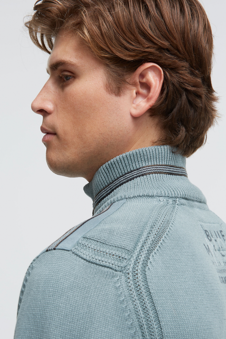 Troyer svetr se zipem, pásky a potisky