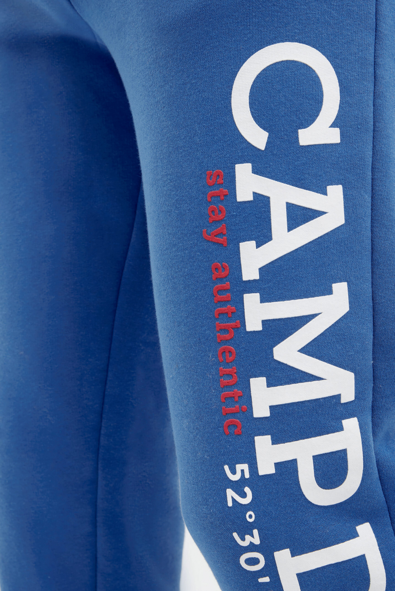 Tepláky s gumovým potiskem loga